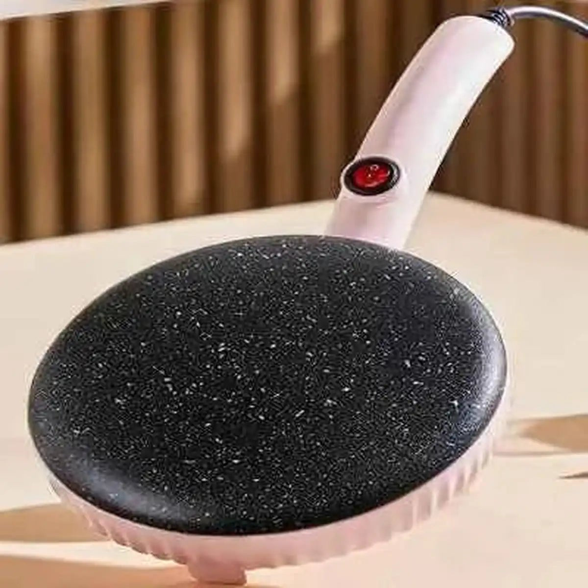 Poêle à crêpe électrique rose PancakeMaker avec revêtement antiadhésif noir, idéale pour une cuisson uniforme sur plaque à induction